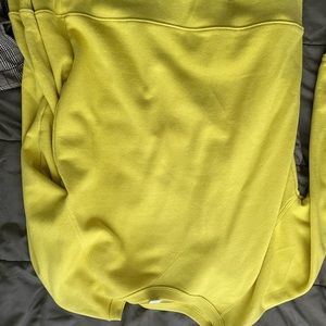 yellow-ish sweater